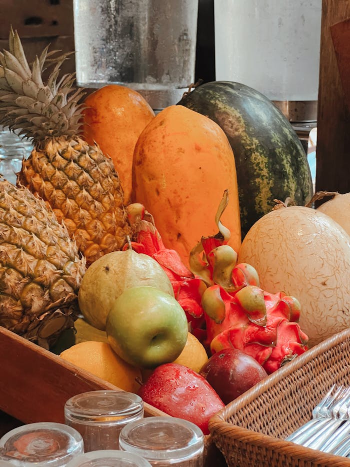 Home A vibrant assortment of tropical fruits including pineapple, papaya, and dragon fruit on display.